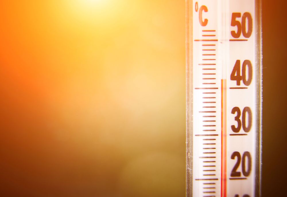 heat wave and thermometer showing for high temperature